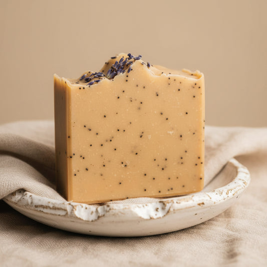 Bar of soap with specks on a textured white background